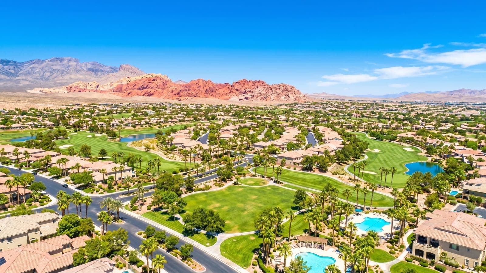The Summit Club, Las Vegas — ultra-private Discovery Land Company community with Tom Fazio golf on the western rim of Summerlin against Red Rock Canyon